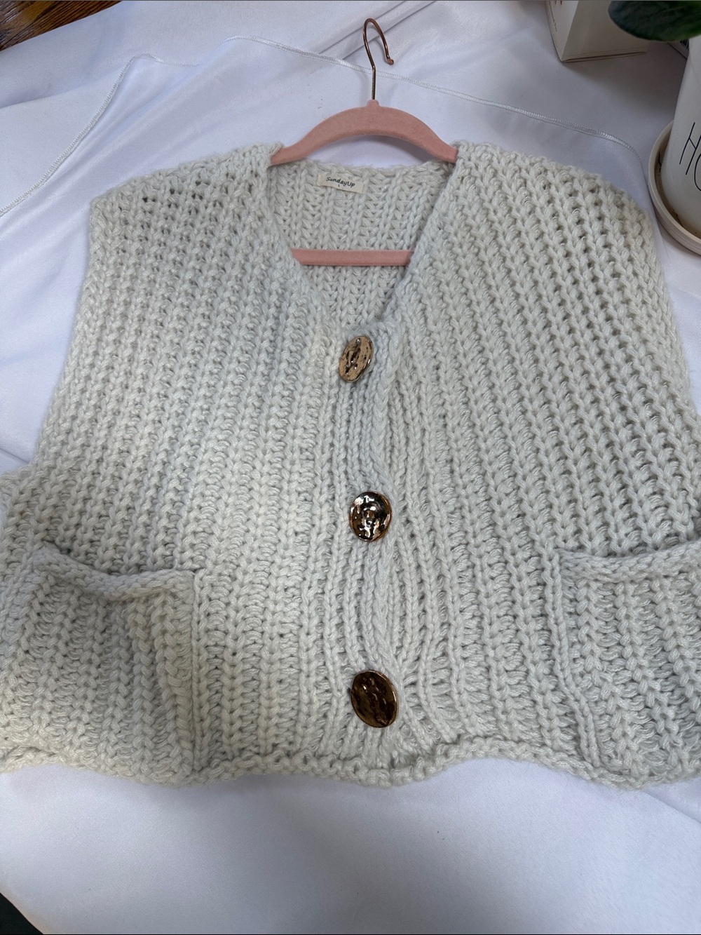 Sunday Up chunky knit vest with large gold buttons. Square pockets.